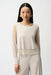 Woman wearing Joseph Ribkoff mesh sleeves layered lining top styled for evening events, office chic, dinner dates, and elegant modern occasions.