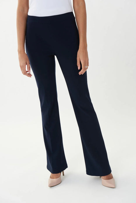 Woman wearing Joseph Ribkoff classic flared pants for elegant office outfit