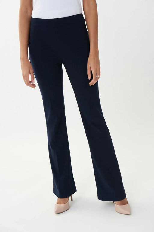 Woman wearing Joseph Ribkoff classic flared pants for elegant office outfit