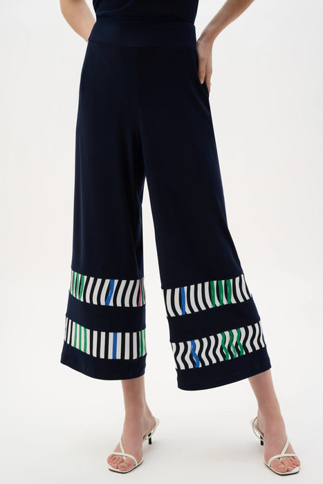Woman wearing Joseph Ribkoff midnight blue multi stripe culotte pants