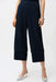 Woman wearing a navy blue textured pull on cropped pants with wide leg from Joseph Ribkoff