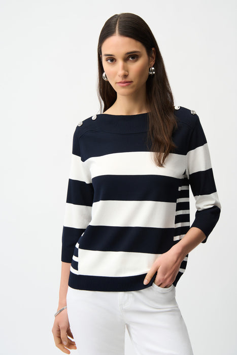 Woman wearing a navy and white striped sweater with boat neck and 3/4 sleeves from Joseph Ribkoff
