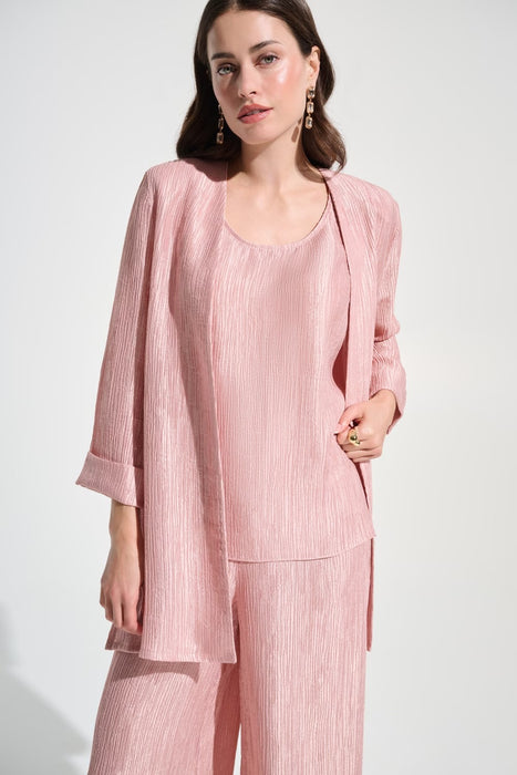 Woman wearing Joseph Ribkoff light pink crinkle jacquard straight cover-up, featuring a textured fabric, open-front design, and elegant lightweight layering fit.