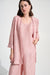 Woman wearing Joseph Ribkoff light pink crinkle jacquard straight cover-up, featuring a textured fabric, open-front design, and elegant lightweight layering fit.