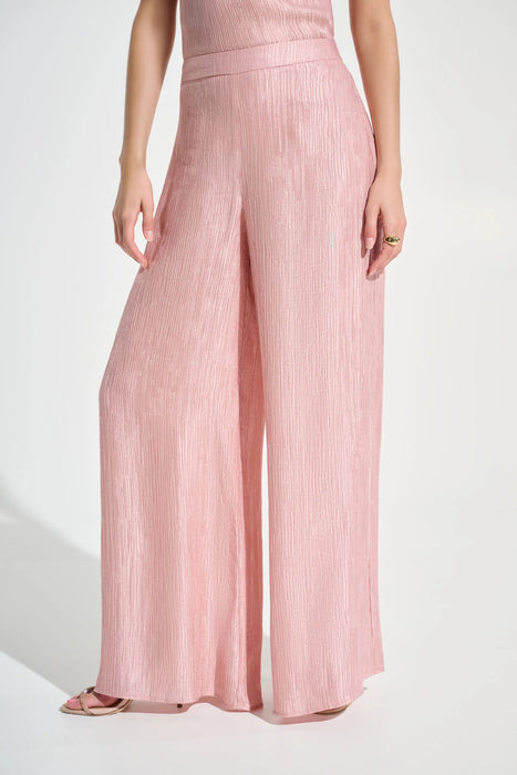 Woman wearing Joseph Ribkoff misty rose crinkle jacquard pull-on wide leg pants, featuring a textured fabric, flowy silhouette, and elegant relaxed fit.