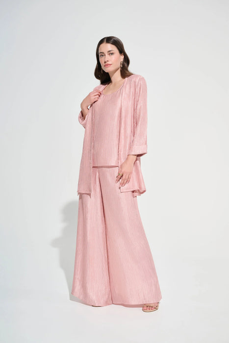 Woman wearing Joseph Ribkoff misty rose crinkle jacquard straight cover-up, featuring a textured fabric, open-front design, and elegant lightweight layering fit.