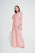 Woman wearing Joseph Ribkoff misty rose crinkle jacquard straight cover-up, featuring a textured fabric, open-front design, and elegant lightweight layering fit.