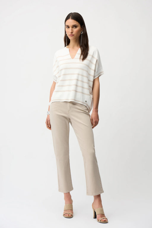 Woman wearing beige straight leg ankle-length jeans from Joseph Ribkoff