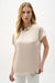 Woman wearing a beige satin top with crew neck and short sleeves from Joseph Ribkoff