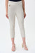 Woman wearing high-waist cropped woven pants with a slim-leg silhouette, styled for office wear, travel, business casual outfits, or sophisticated everyday fashion.