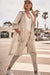 Woman wearing a moonstone mesh A-line hooded cover-up with patch pockets, styled over a neutral top and black pants.