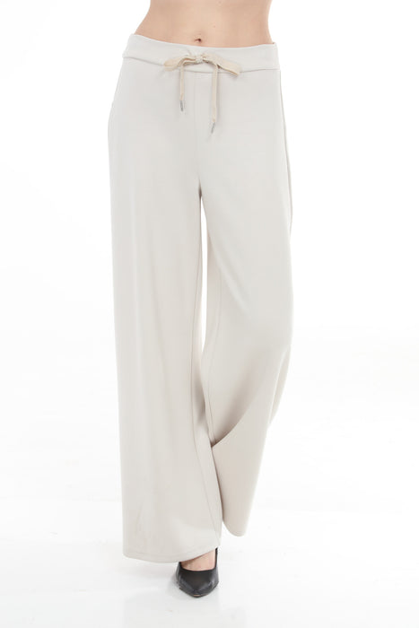 Woman wearing Joseph Ribkoff wide-leg scuba jersey pants for office outfit