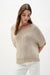 Woman wearing a beige v-neck sweater top with short dolman sleeves from Joseph Ribkoff