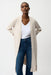 Woman wearing Joseph Ribkoff Moonstone Viscose Blend Long Open Cardigan with ribbed knit texture
