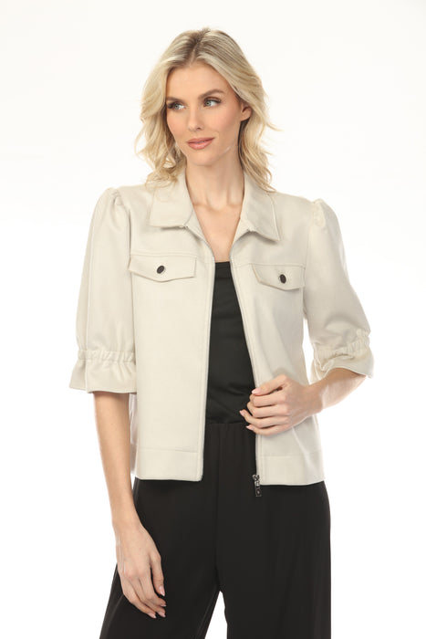 Woman wearing a beige zip front jacket with elbow-length puff sleeves from Joseph Ribkoff