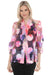 Woman wearing a colorful floral polka dot sheer jacket with 3/4 sleeves from Joseph Ribkoff