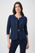 Woman wearing a sparky navy blue matching tank and jacket from Joseph RIbkoff