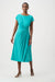 Woman wearing Joseph Ribkoff A-line wrap dress for elegant office outfit