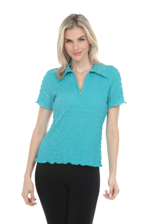 Woman wearing Joseph Ribkoff textured knit zip top for elegant office outfit
