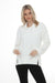 Woman wearing Joseph Ribkoff funnel neck tunic top for chic travel outfit
