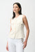 Woman wearing an off-white button front vest with gold stripes from Joseph Ribkoff