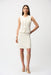 Woman wearing an off-white A-line skirt with gold stripes from Joseph Ribkoff