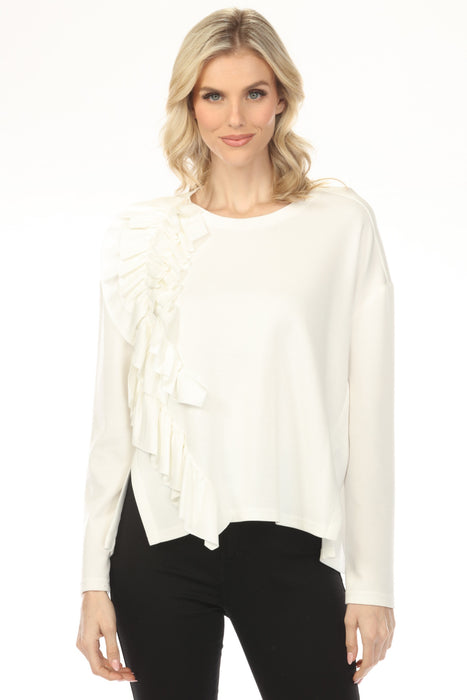 Woman wearing a white long sleeve blouse with ruffled details and split sides from Joseph Ribkoff