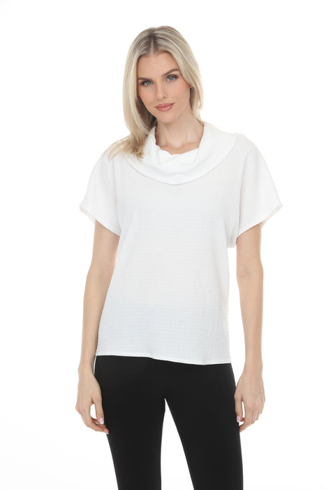 Woman wearing a white textured boxy top with cowl neck and short sleeves from Joseph Ribkoff