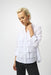 Woman wearing a white woven blouse with layered ruffles at the front and button closure