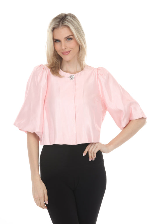 Woman wearing Joseph Ribkoff shimmer puff sleeve jacket for wedding guest outfit