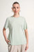 Woman wearing Joseph Ribkoff adjustable sides boxy top styled for casual chic outfits, travel wear, office casual looks, and modern everyday fashion.