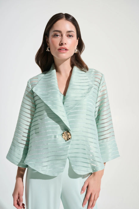 Woman wearing Joseph Ribkoff pistachio swing lapel jacket with shadow stripe