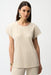 Woman wearing Joseph Ribkoff pleated scuba crepe boxy top styled for office chic, casual outings, travel days, and modern minimalist fashion looks.