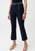 Woman modeling elegant flare pants with slim fit and wide hem