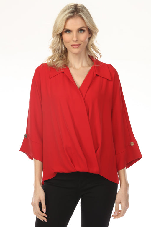 Woman wearing a red collared surplice neck blouson top with 3/4 sleeves from Joseph Ribkoff