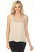 Woman wearing a beige satin sleeveless top with rhinestone-trimmed scoop neckline from Joseph Ribkoff