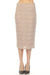 Woman wearing a beige textured pencil skirt with knee length from Joseph Ribkoff
