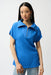 Woman wearing Joseph Ribkoff seersucker boxy top with memory collar, featuring a textured fabric, zip neckline, short sleeves, and a relaxed modern fit.