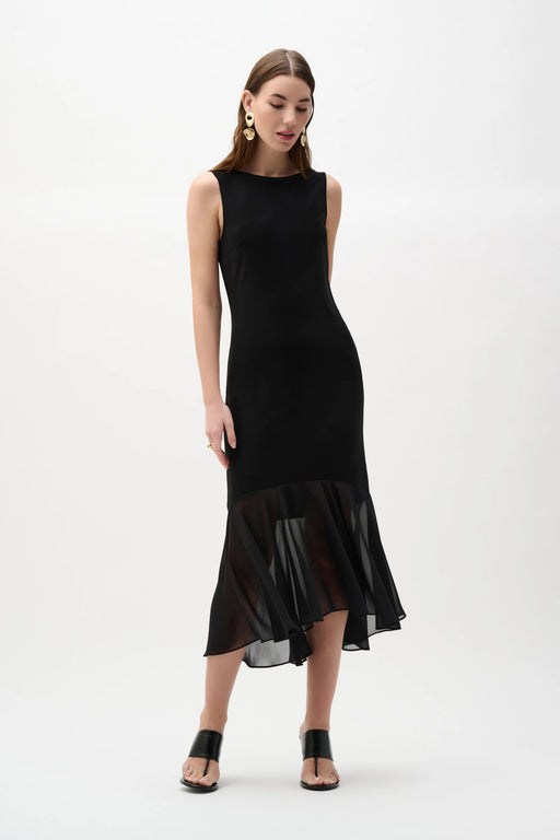 Woman wearing knit dress with chiffon flounce hem and sleeveless elegant silhouette