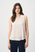Woman wearing Joseph Ribkoff silky knit layered sleeveless top styled for office wear, casual outings, layering under blazers, and polished everyday looks.