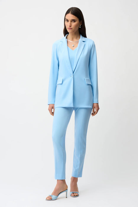 Woman wearing a Joseph Ribkoff straight blazer styled with tailored separates for a polished business-casual and professional look.