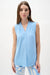 Woman wearing Joseph Ribkoff straight pleated tunic for elegant office outfit