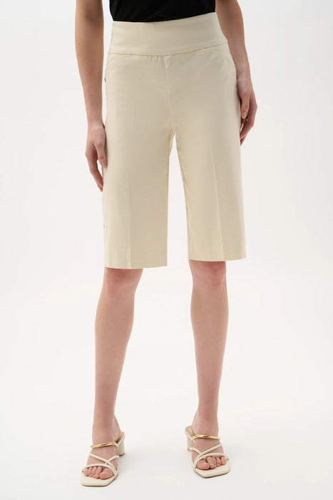 Woman wearing Joseph Ribkoff Bermuda shorts for business casual office outfit
Woman in tailored knee length pull-on
