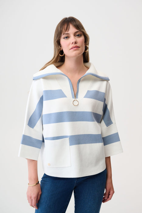 Woman wearing a striped sweater in white and blue with zip collar and 3/4 sleeves from Joseph Ribkoff