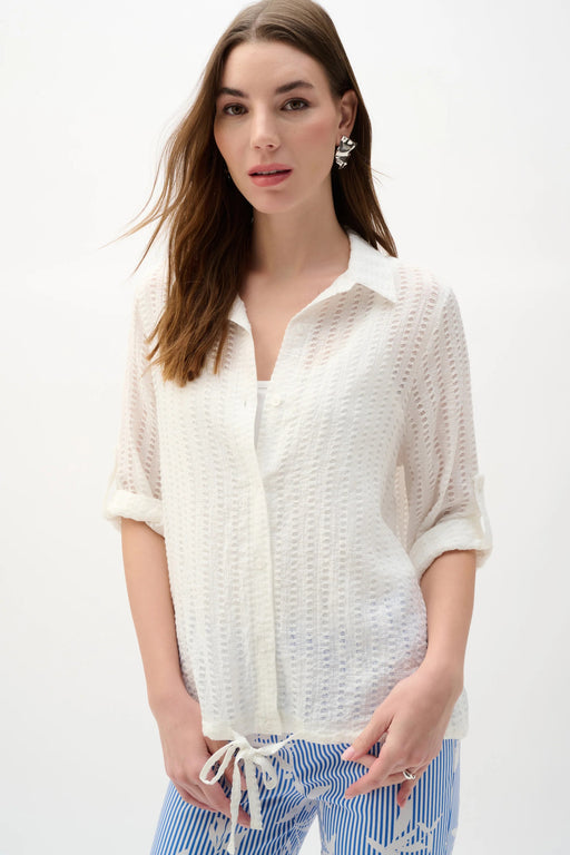 Woman wearing Joseph Ribkoff vanilla drawstring hem cocoon blouse styled for office chic, casual outings, travel days, and modern elegant everyday wear.