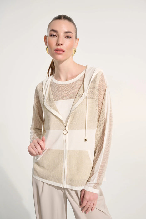 Woman wearing a vanilla and gold straight hooded zip jacket with lightweight mesh fabric and sheer panels, styled for a modern and breathable layered look.
