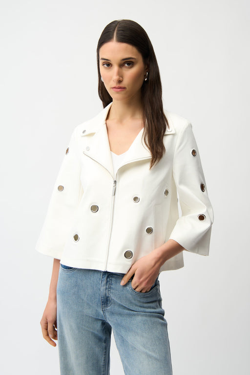 Woman wearing a white zip front jacket with grommet details from Joseph Ribkoff