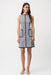 Woman wearing sleeveless A-line dress with geometric pattern and contrast trim from Joseph Ribkoff