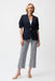 Woman wearing a geometric-patterned pull-on pants with crop flared leg from Joseph Ribkoff