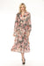 Woman wearing a floral printed midi dress with drawstring waist and button front closure from Joseph Ribkoff